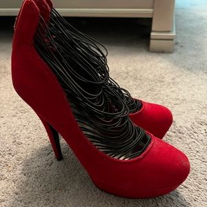 Red high heel pumps